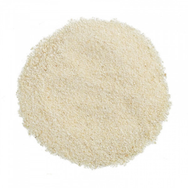 A white round pile of rice on top of a table.